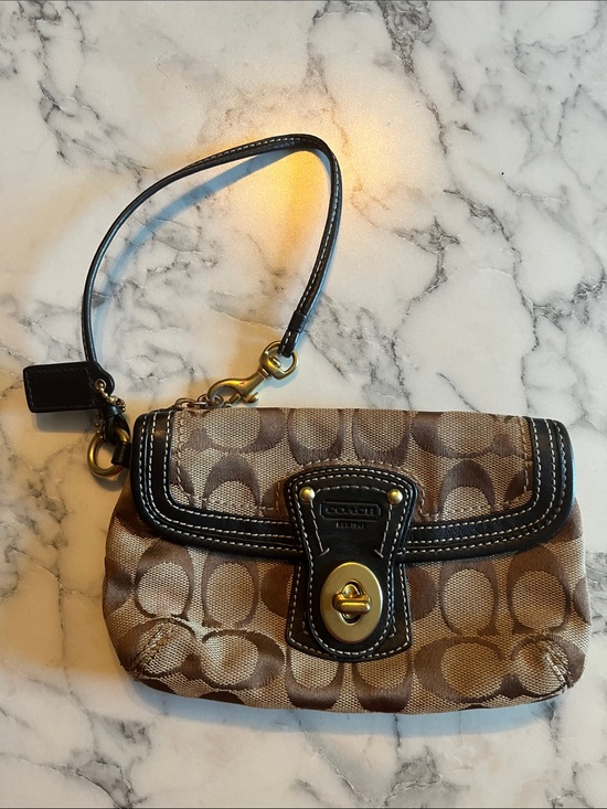 Coach Handbags - Coach Brown Signature Canvas Wristlet with Black Trim & Gold Hardware